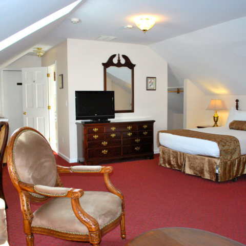 Junior residential bed, white and gold accent bedding.